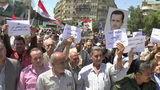 Жители сирийских городов вышли на улицы в знак поддержки вооруженных сил страны, отбивших ракетную атаку