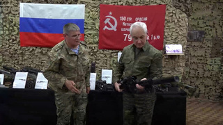 Белоусов осмотрел оружие группировки войск «Днепр» в зоне СВО