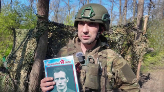 Российские бойцы на передовой присоединились к акции «Бессмертный полк»
